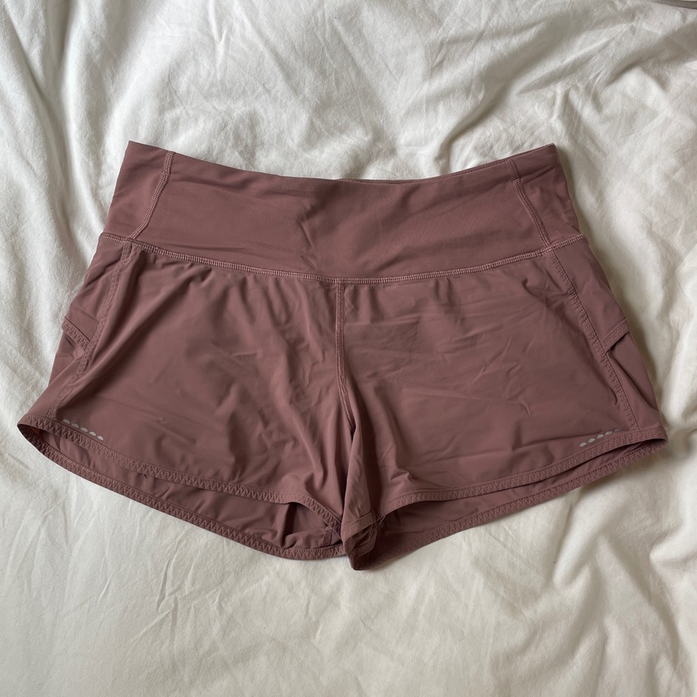 Blush pink low rise LuluLemon Speed Up shorts